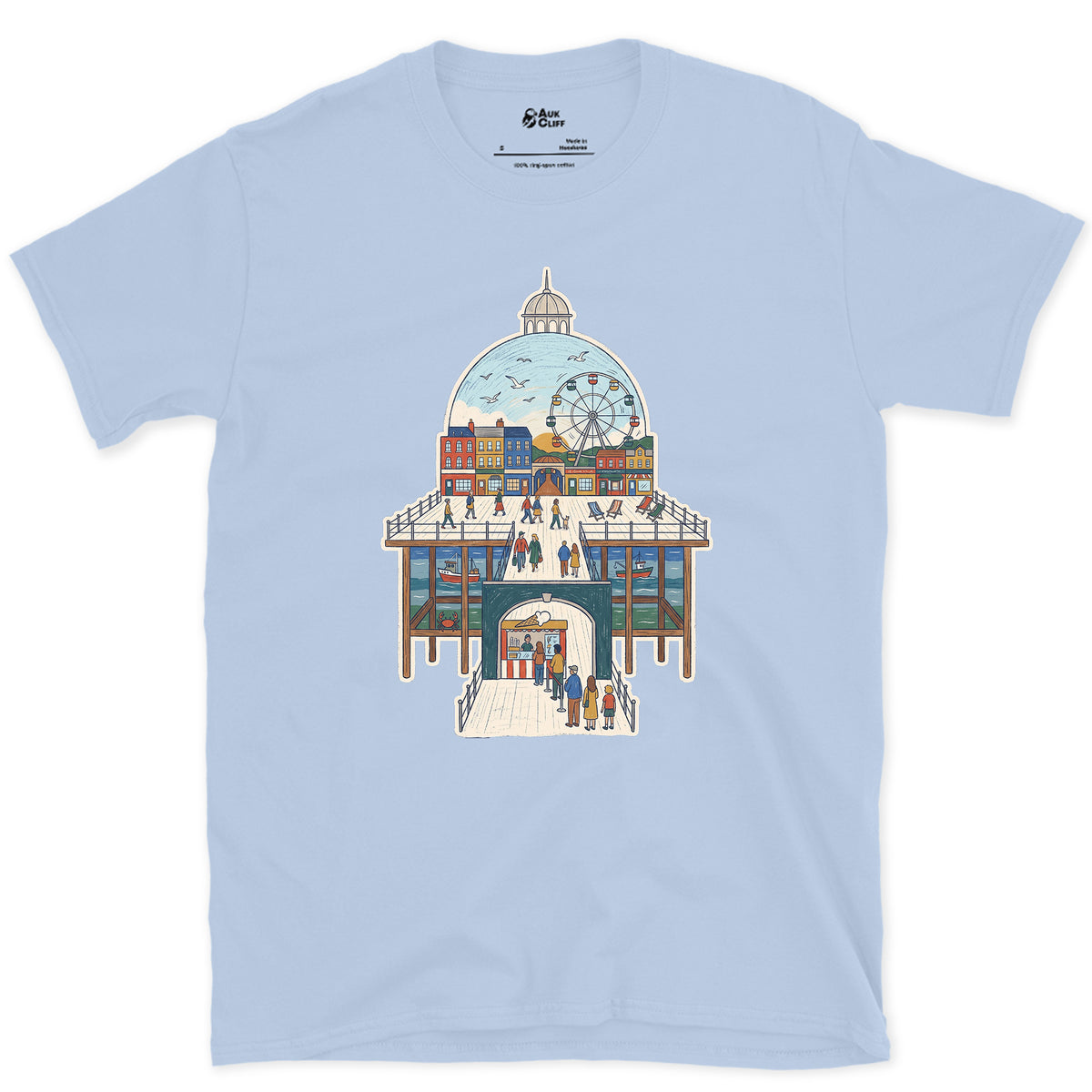 The Town Behind the Pier design on a Light Blue Gildan Softstyle t-shirt
