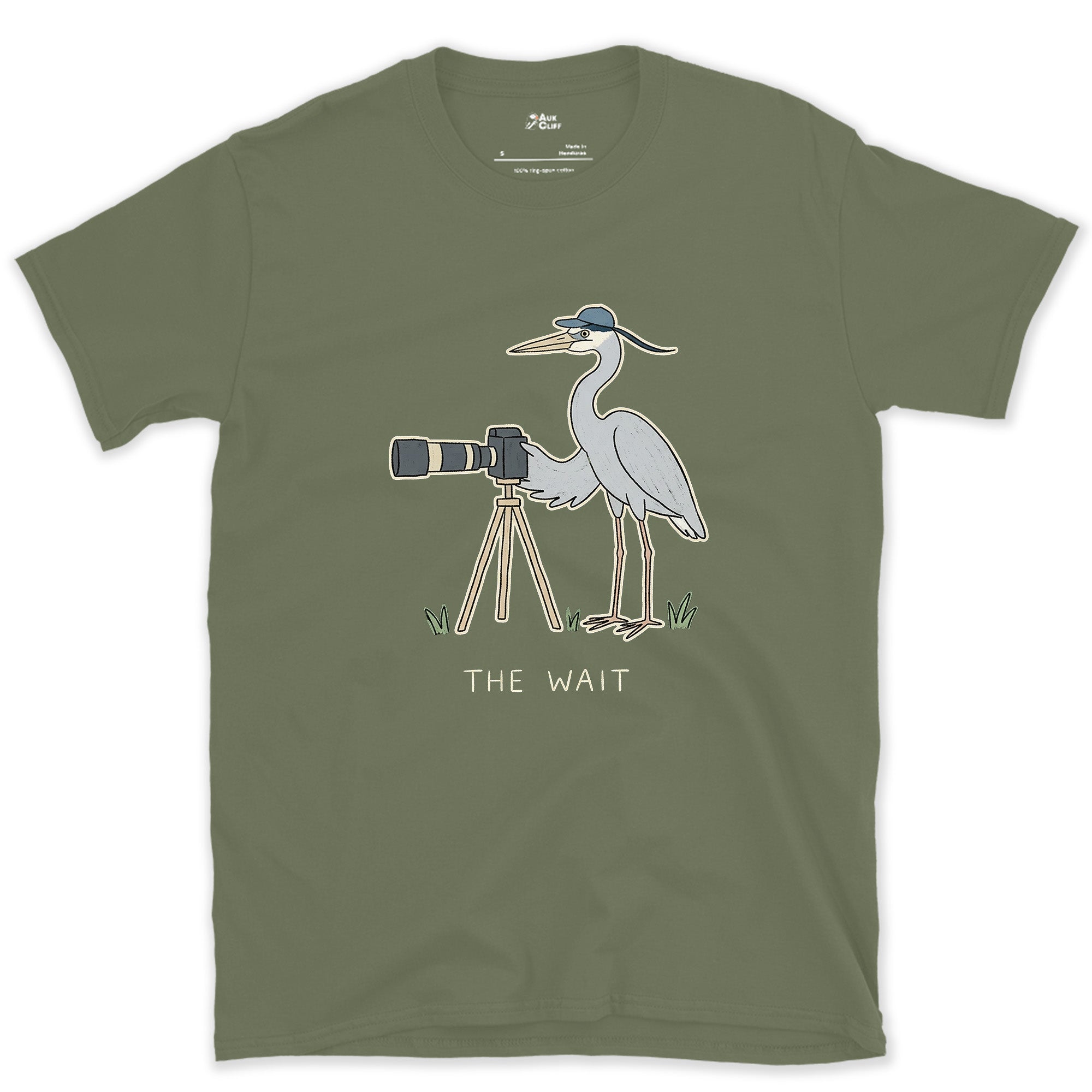 The Wait, Heron With a Tripod design on a Military Green Gildan Softstyle t-shirt