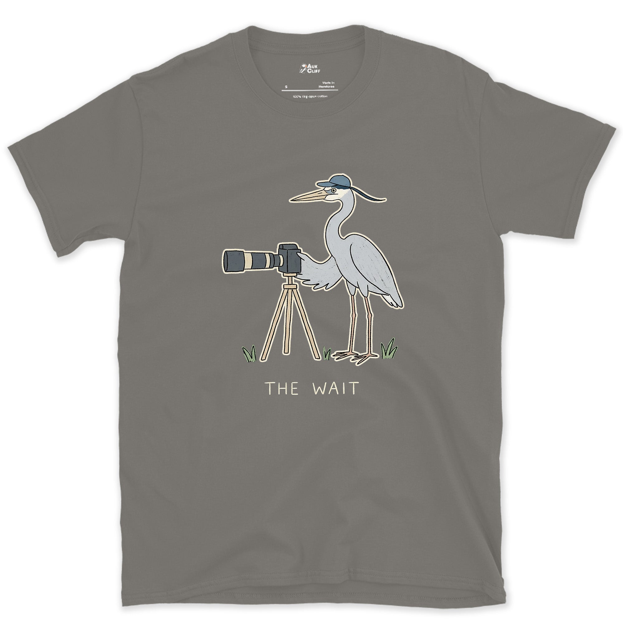 The Wait, Heron With a Tripod design on a Charcoal Gildan Softstyle t-shirt