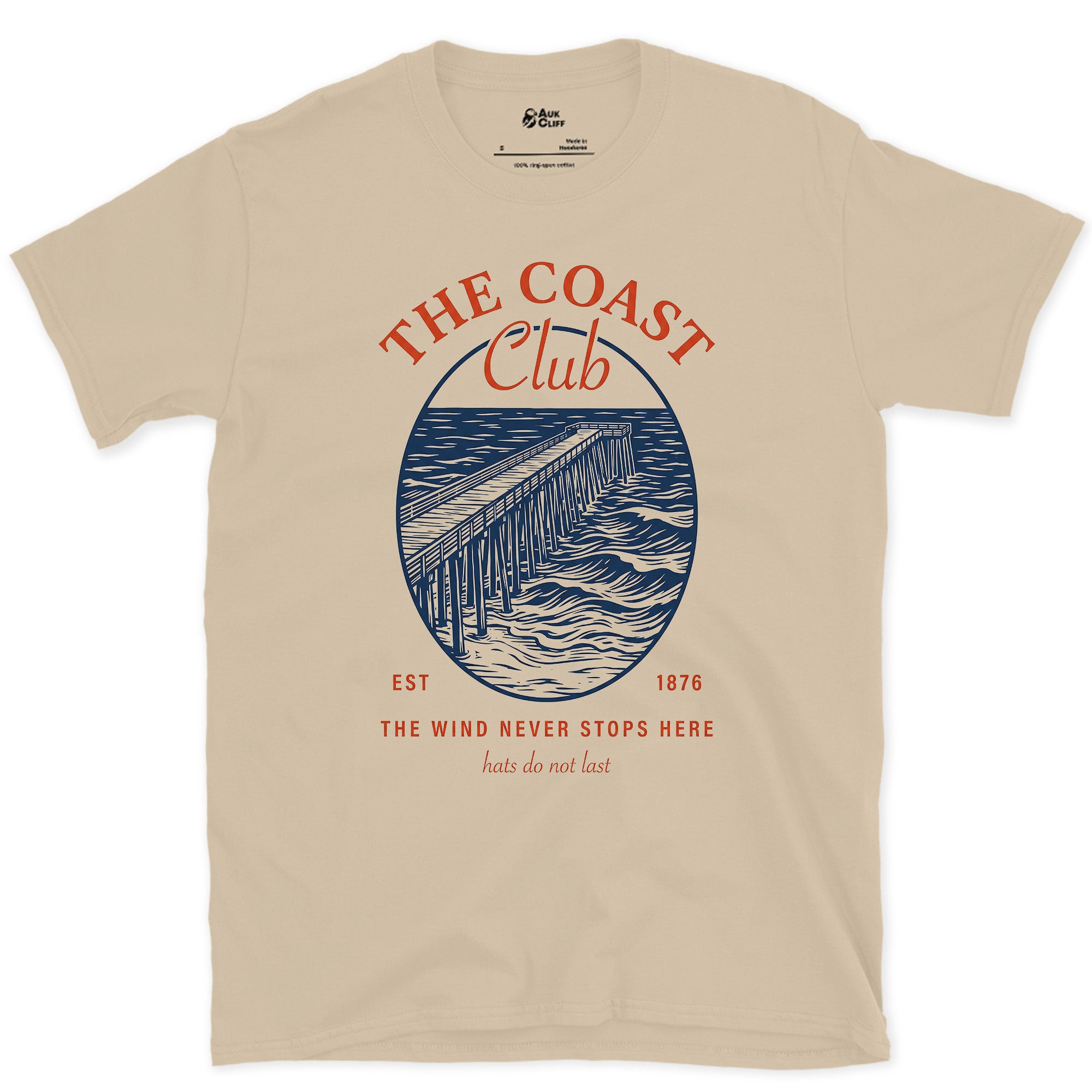 The Wind Never Stops Here, Coast Club design on a Sand Gildan Softstyle t-shirt