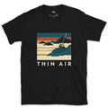 Thin Air, Cabin Above the Cloud Inversion design on a Black Gildan Softstyle t-shirt