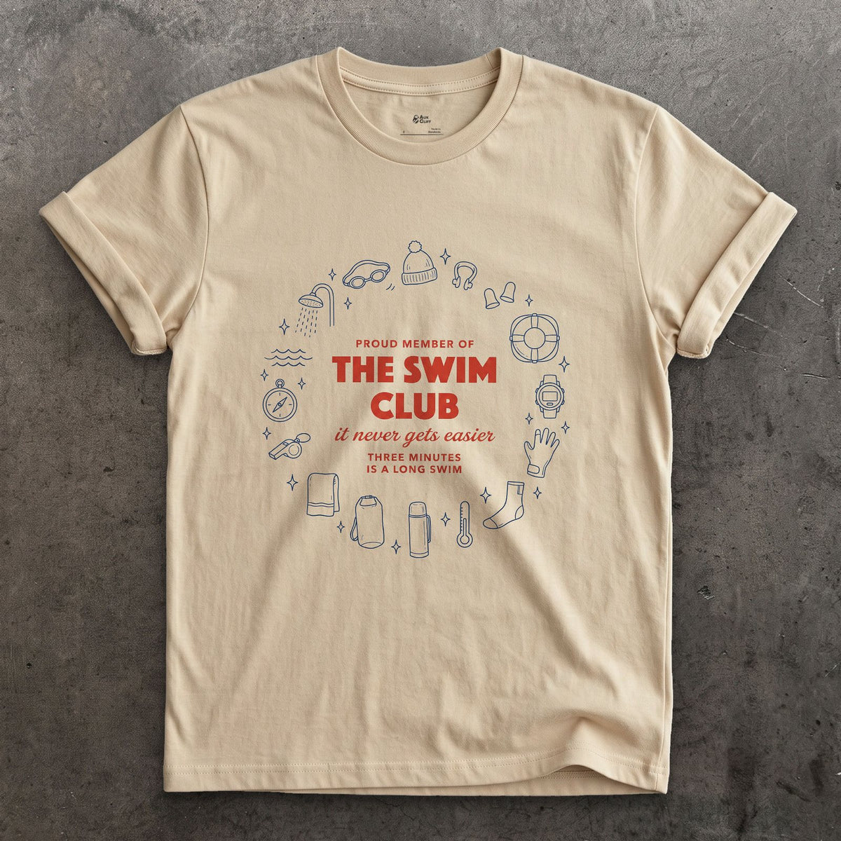 It Never Gets Easier, Three Minutes Is a Long Swim design on a Sand Gildan Softstyle t-shirt