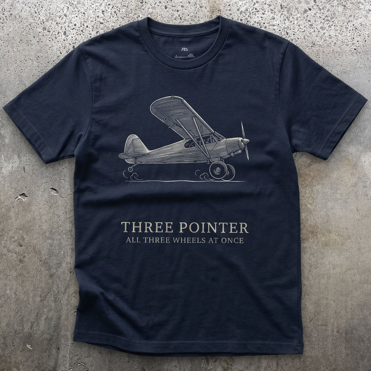 Three Pointer, All Three Wheels design on a Navy Gildan Softstyle t-shirt