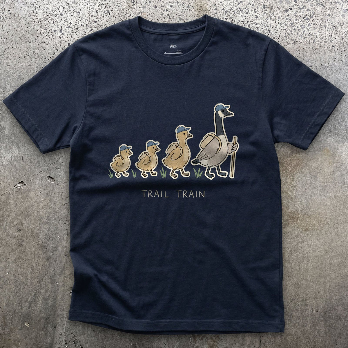 The Trail Train, Goose and Goslings design on a Navy Gildan Softstyle t-shirt
