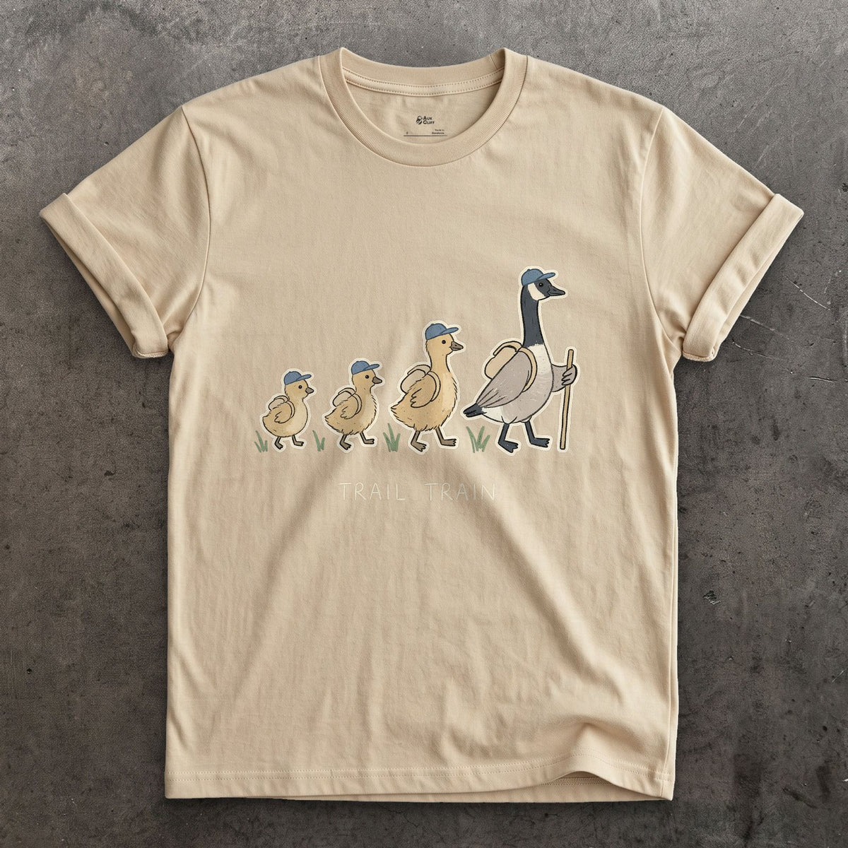 The Trail Train, Goose and Goslings design on a Sand Gildan Softstyle t-shirt