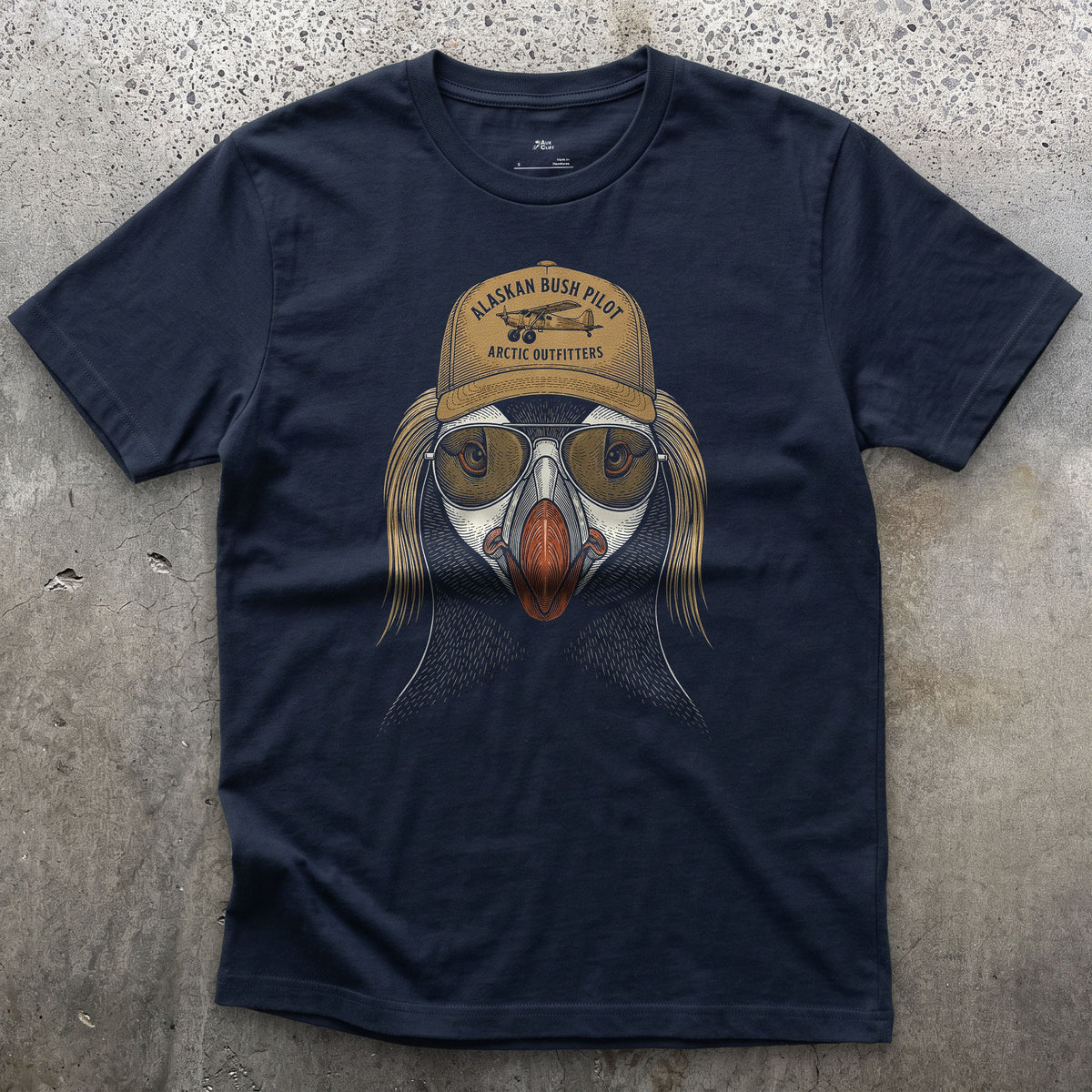 Alaskan Bush Pilot, Tufted Puffin design on a Navy Gildan Softstyle t-shirt