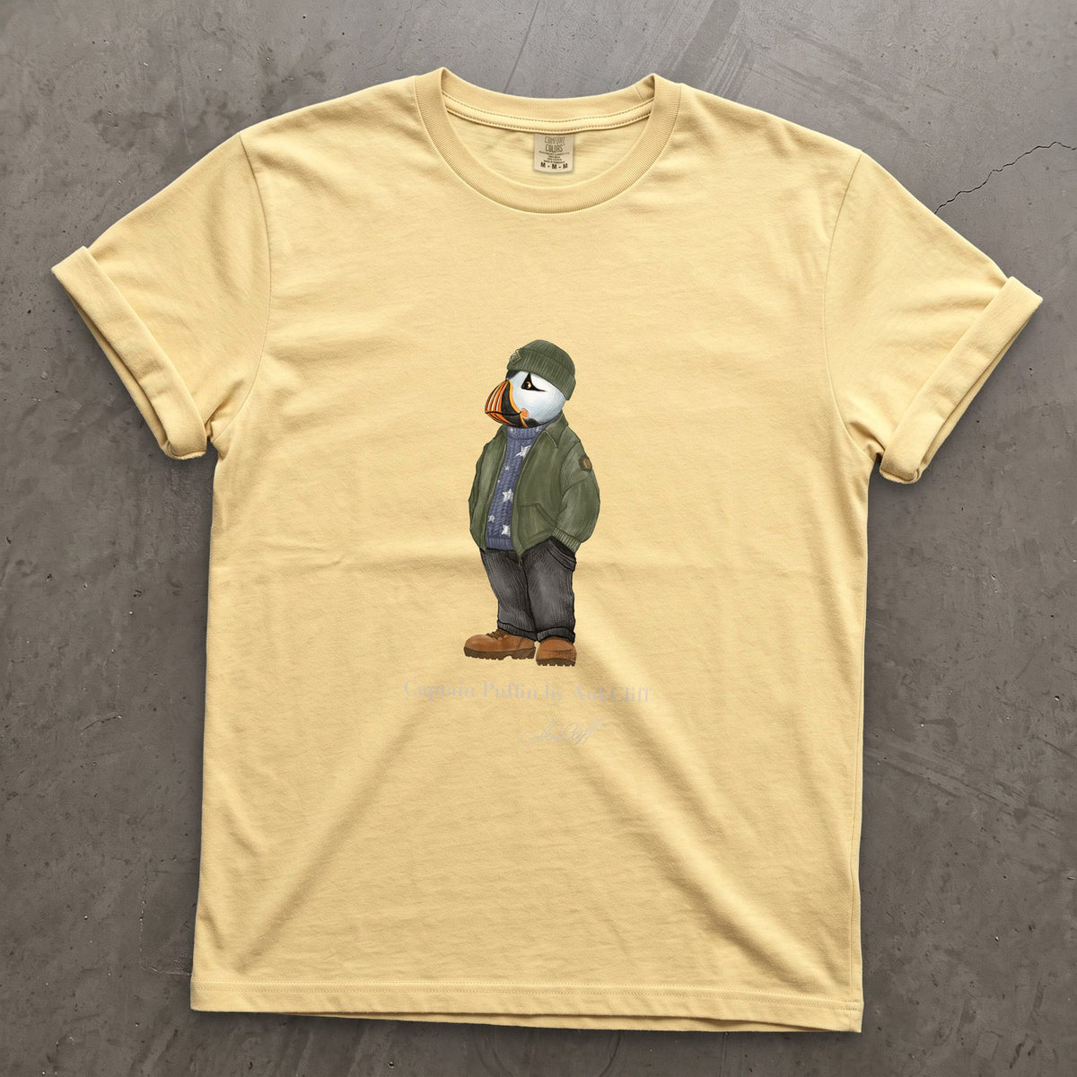 Captain Puffin American Trailkeeper on a Butter Comfort Colors t-shirt