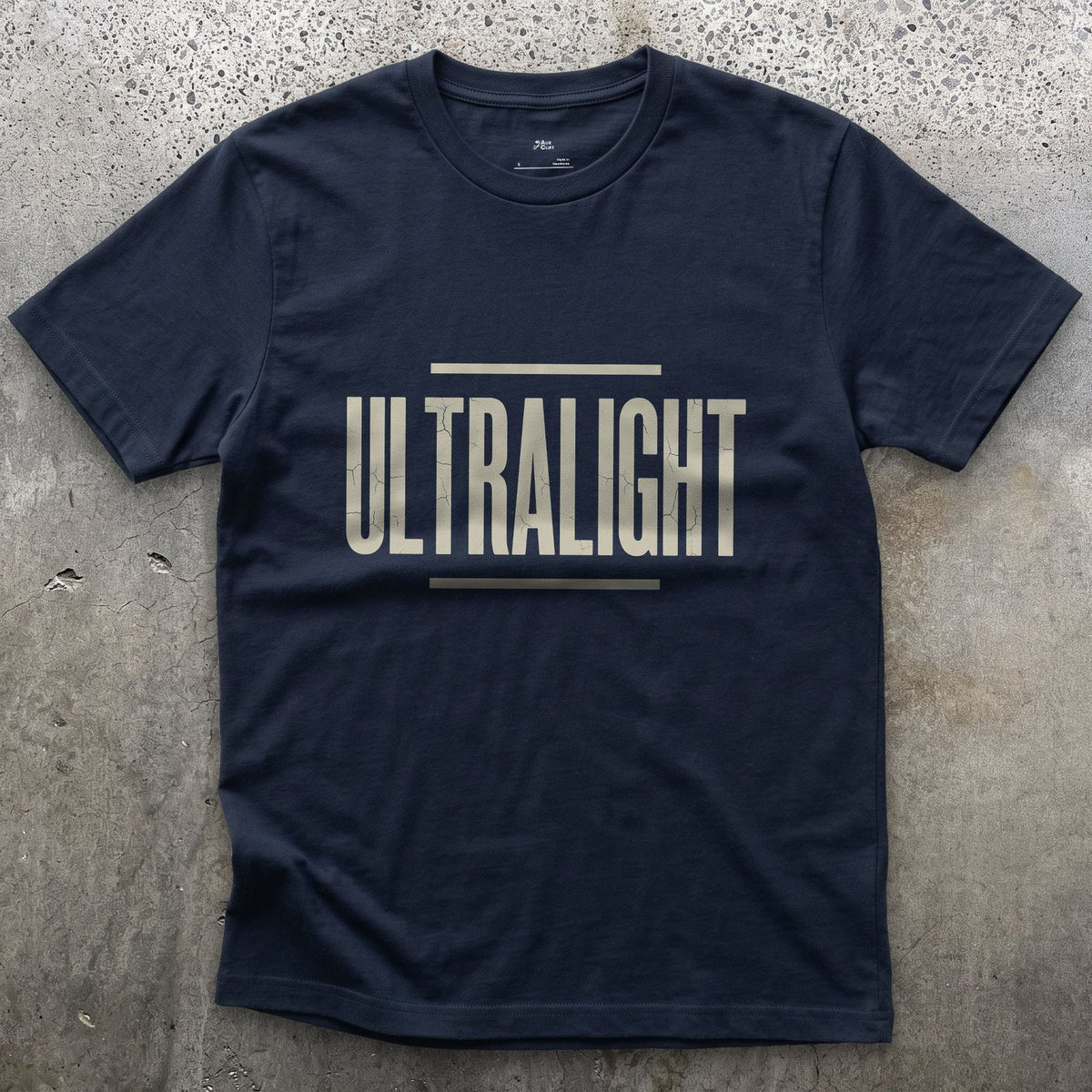 Ultralight, Cut Down to the Smallest Pack design on a Navy Gildan Softstyle t-shirt