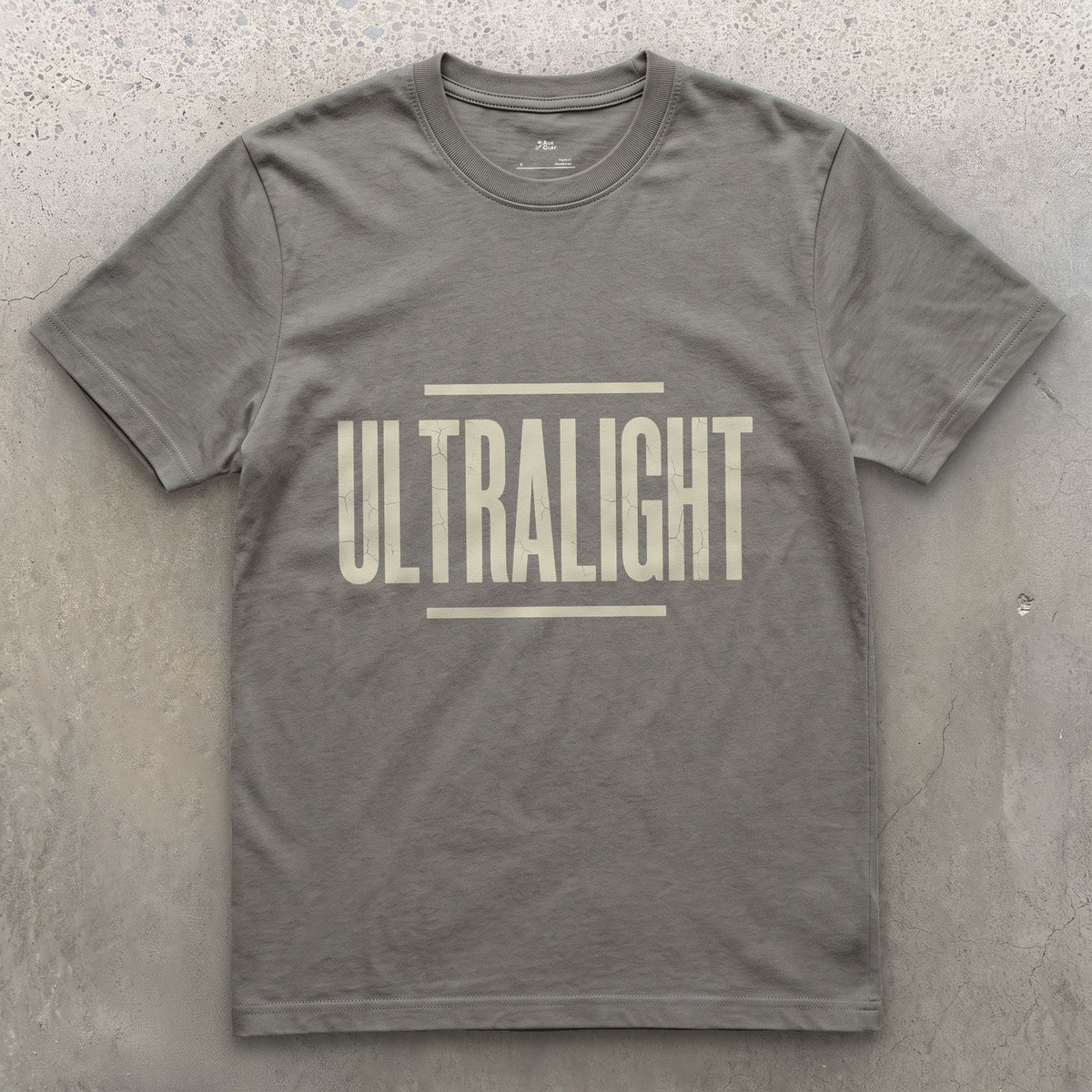 Ultralight, Cut Down to the Smallest Pack design on a Charcoal Gildan Softstyle t-shirt