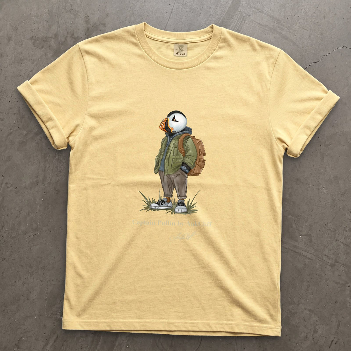 Captain Puffin Urban Hiker on a Butter Comfort Colors t-shirt