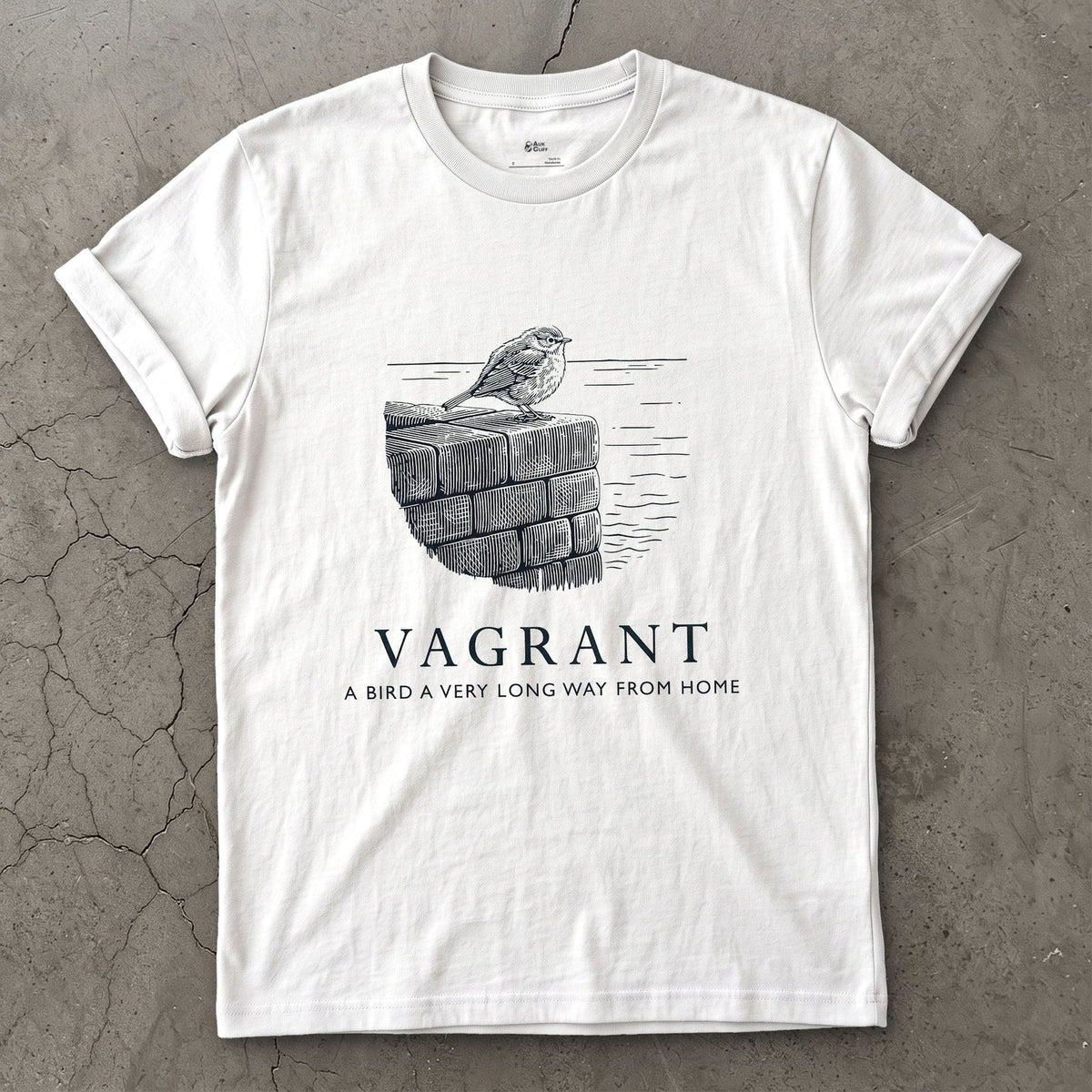 Vagrant, a Bird a Very Long Way From Home design on a White Gildan Softstyle t-shirt
