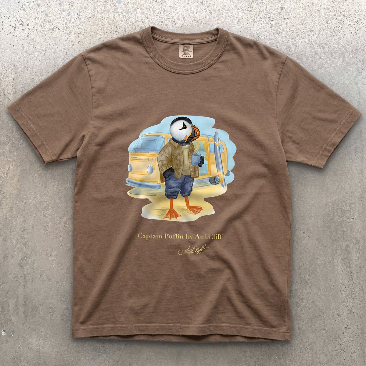 Captain Puffin Van Life Surfer on a Espresso Comfort Colors t-shirt