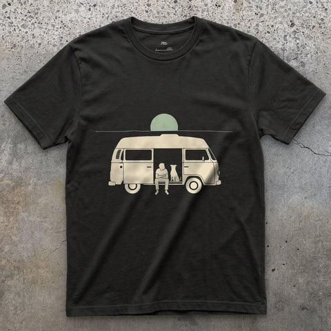 Person, Dog and a Full Moon Through the Camper Door design on a Black Gildan Softstyle t-shirt