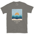 Vitamin Sea, Layered Waves and Shells design on a Charcoal Gildan Softstyle t-shirt