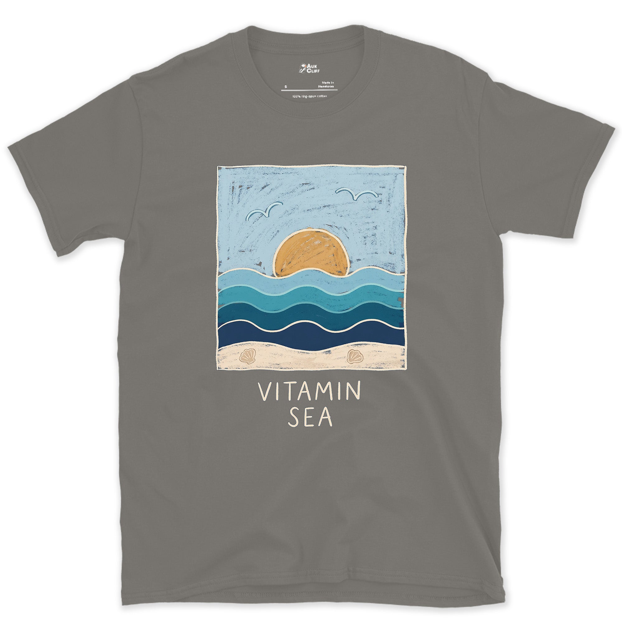 Vitamin Sea, Layered Waves and Shells design on a Charcoal Gildan Softstyle t-shirt