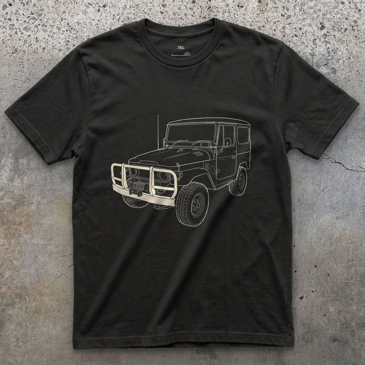 Creases Picked Out by Hand, 4x4 Wagon design on a Black Gildan Softstyle t-shirt