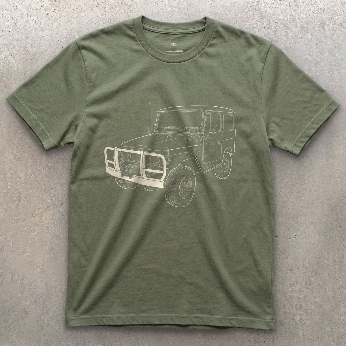 Creases Picked Out by Hand, 4x4 Wagon design on a Military Green Gildan Softstyle t-shirt