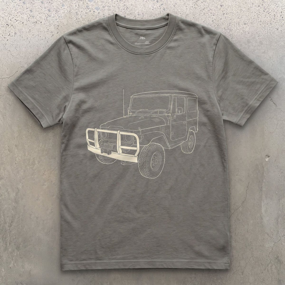 Creases Picked Out by Hand, 4x4 Wagon design on a Charcoal Gildan Softstyle t-shirt