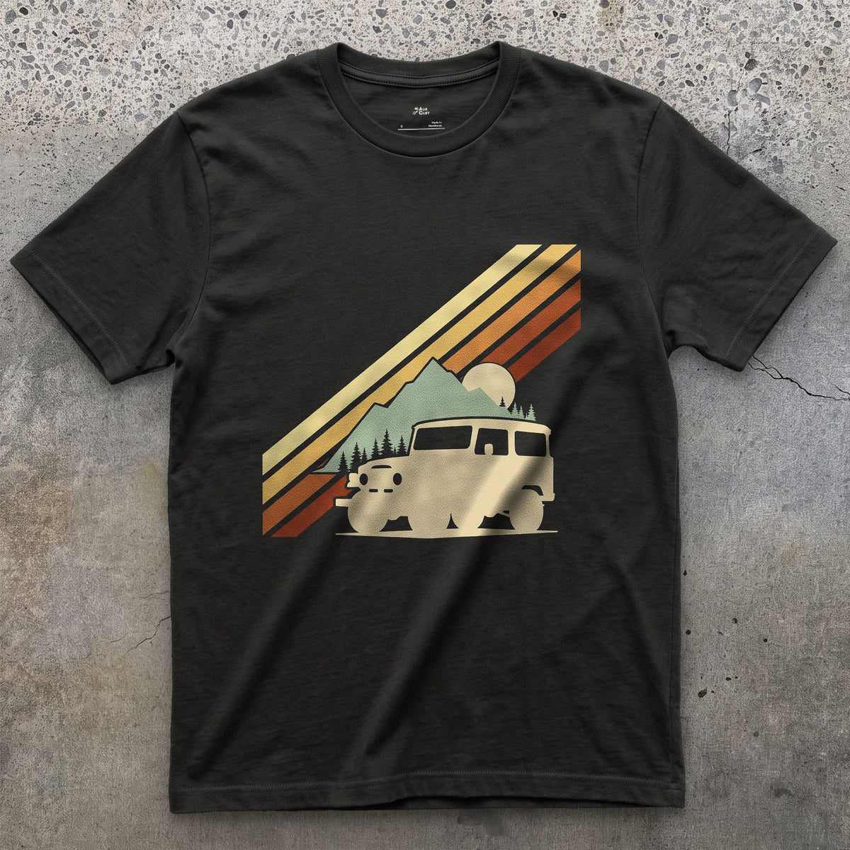 Low Sun Behind the Wagon and the Pines design on a Black Gildan Softstyle t-shirt