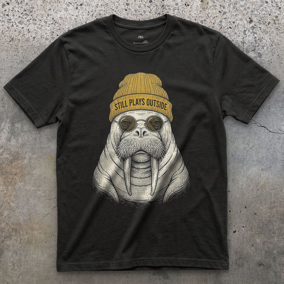 Still Plays Outside, Walrus in a Beanie design on a Black Gildan Softstyle t-shirt