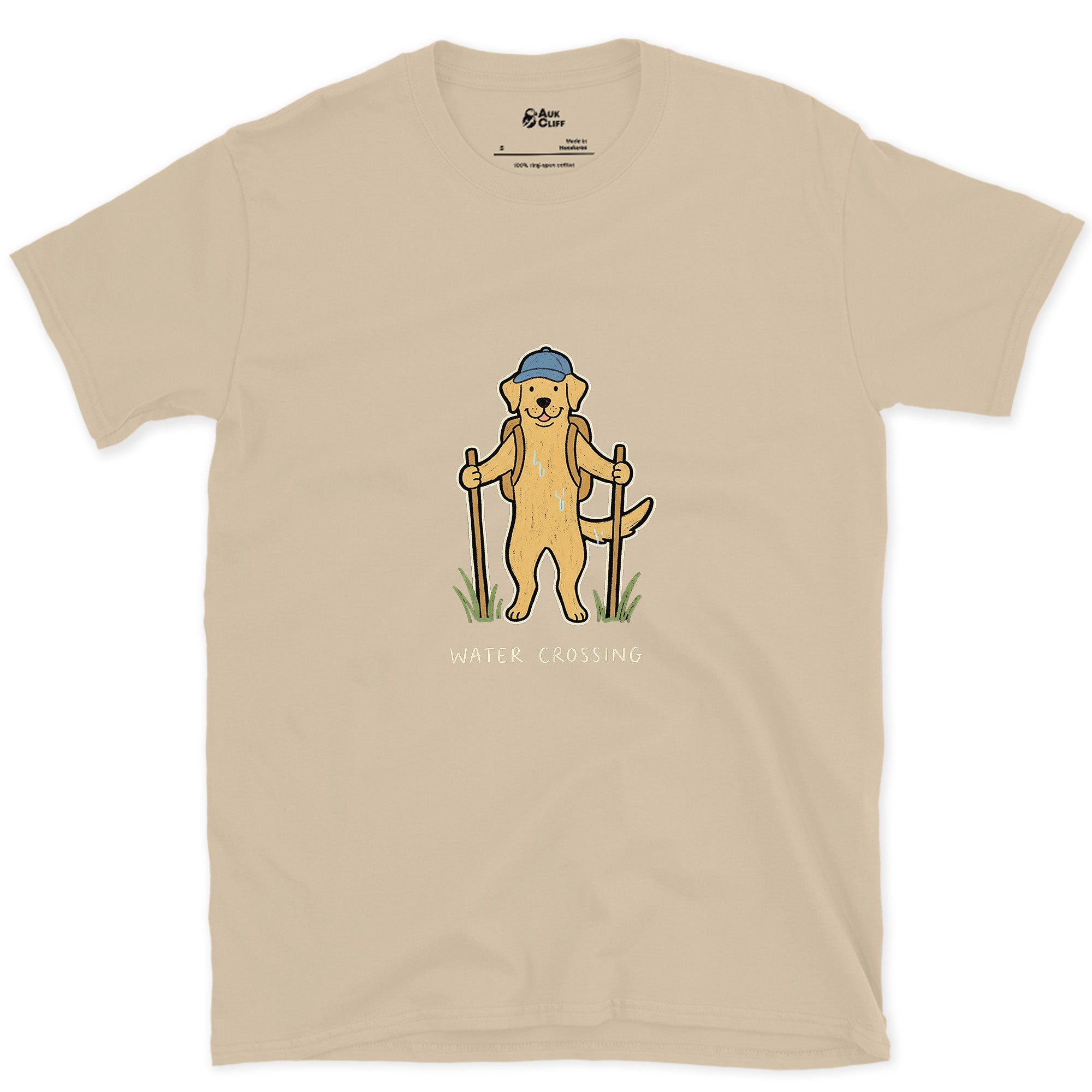 First Through Every Trail Crossing, Labrador design on a Sand Gildan Softstyle t-shirt