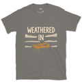 Weathered In, Bush Plane Under Low Cloud design on a Charcoal Gildan Softstyle t-shirt