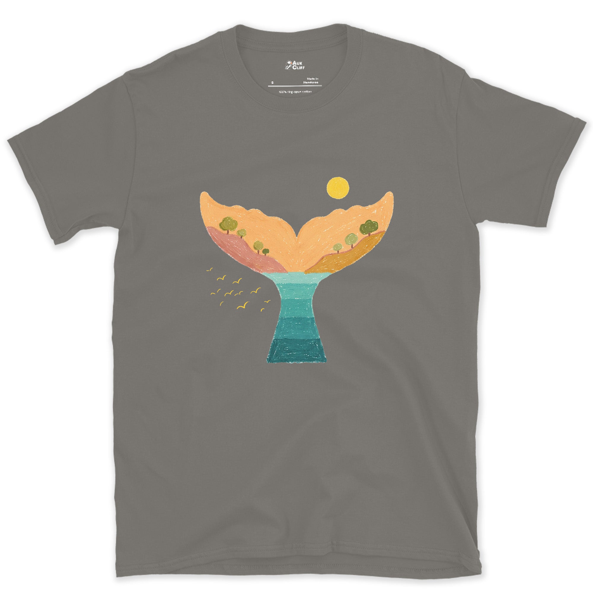 Sunset Hills Filling a Whale's Tail design on a Charcoal Gildan Softstyle t-shirt