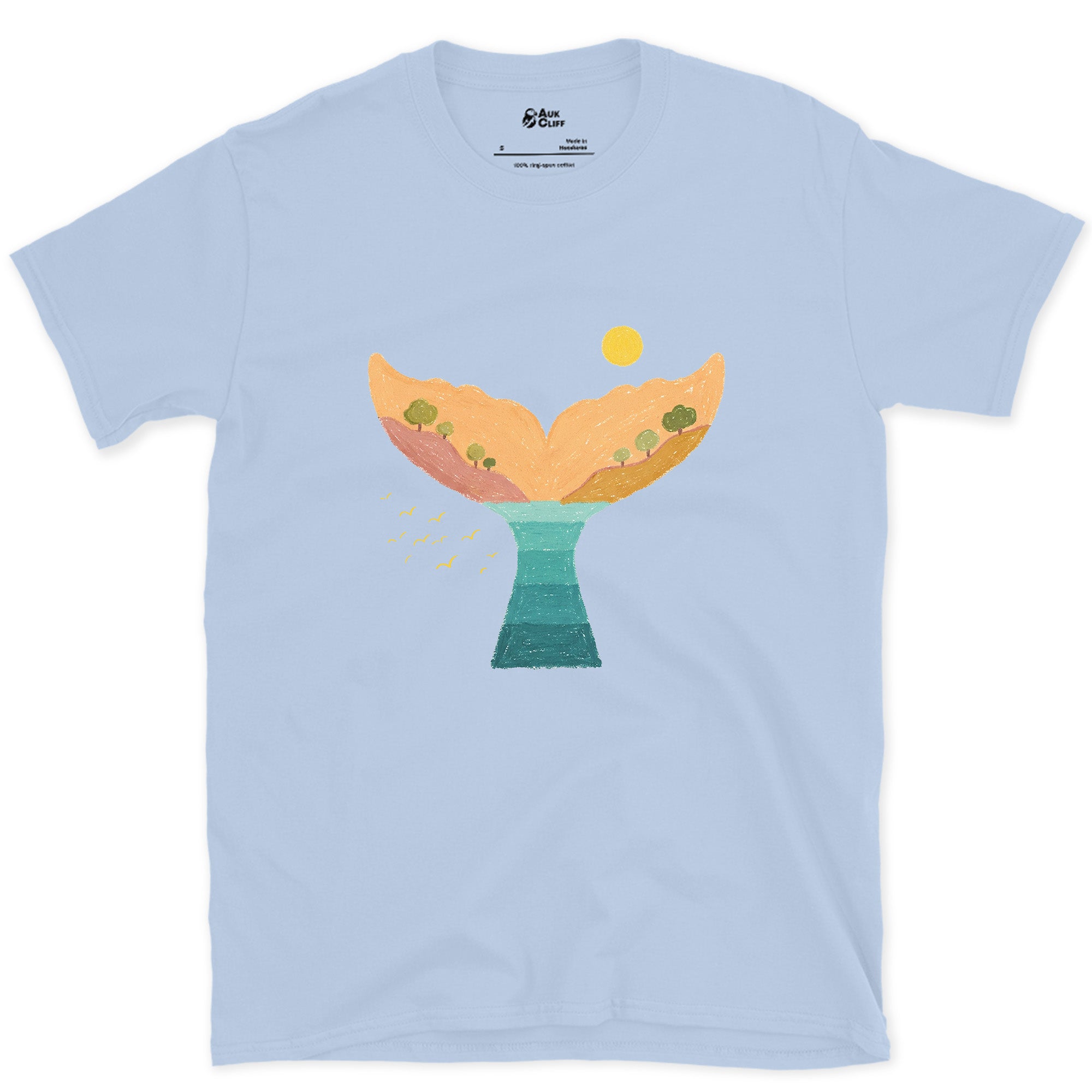 Sunset Hills Filling a Whale's Tail design on a Light Blue Gildan Softstyle t-shirt