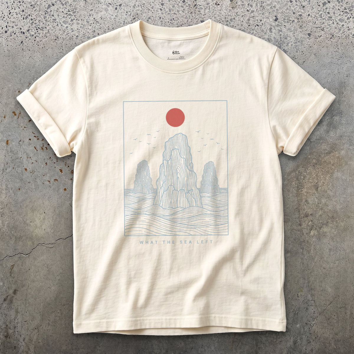What the Sea Left, Stacks and Birds design on a Natural Gildan Softstyle t-shirt