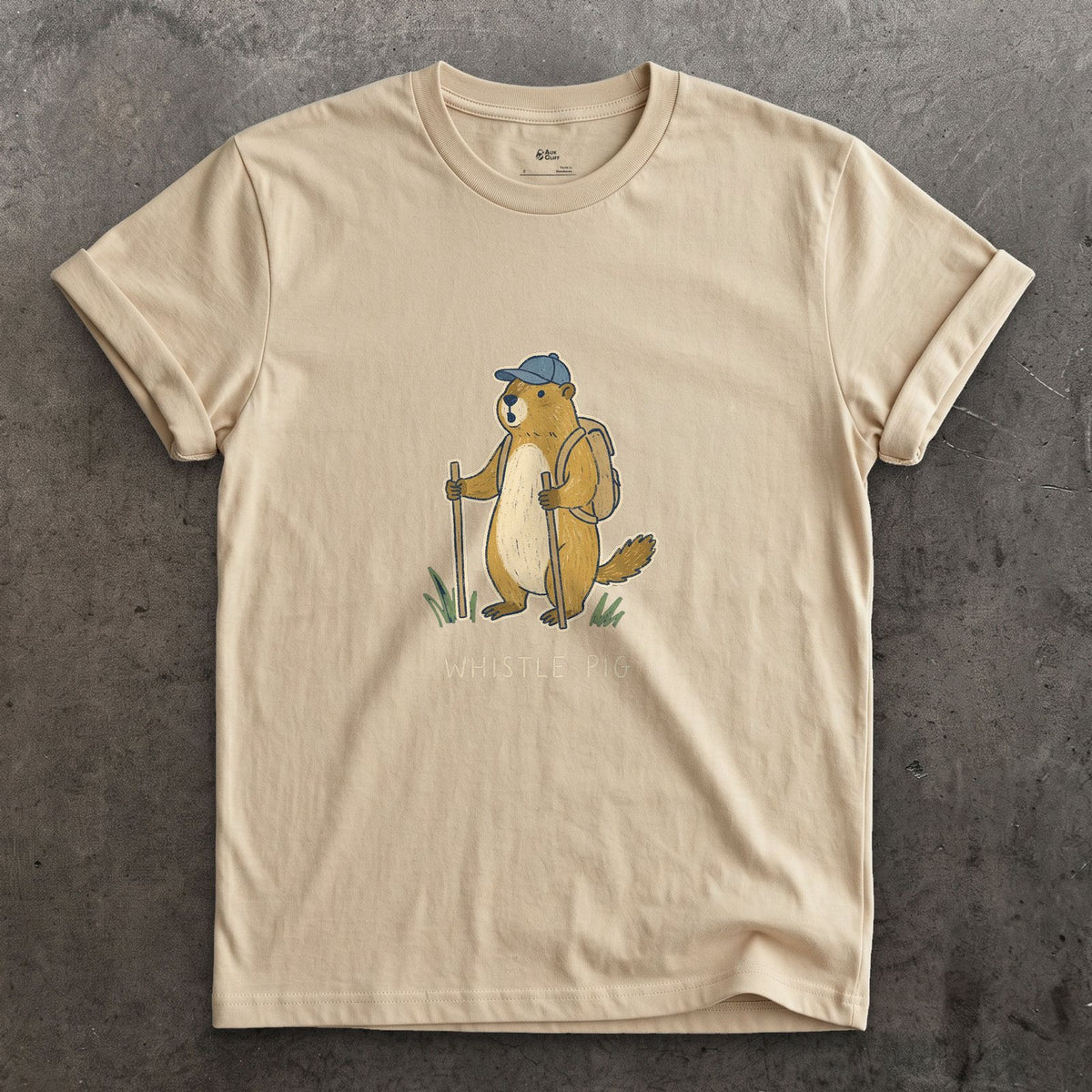 Whistle Pig, Marmot Hiker design on a Sand Gildan Softstyle t-shirt