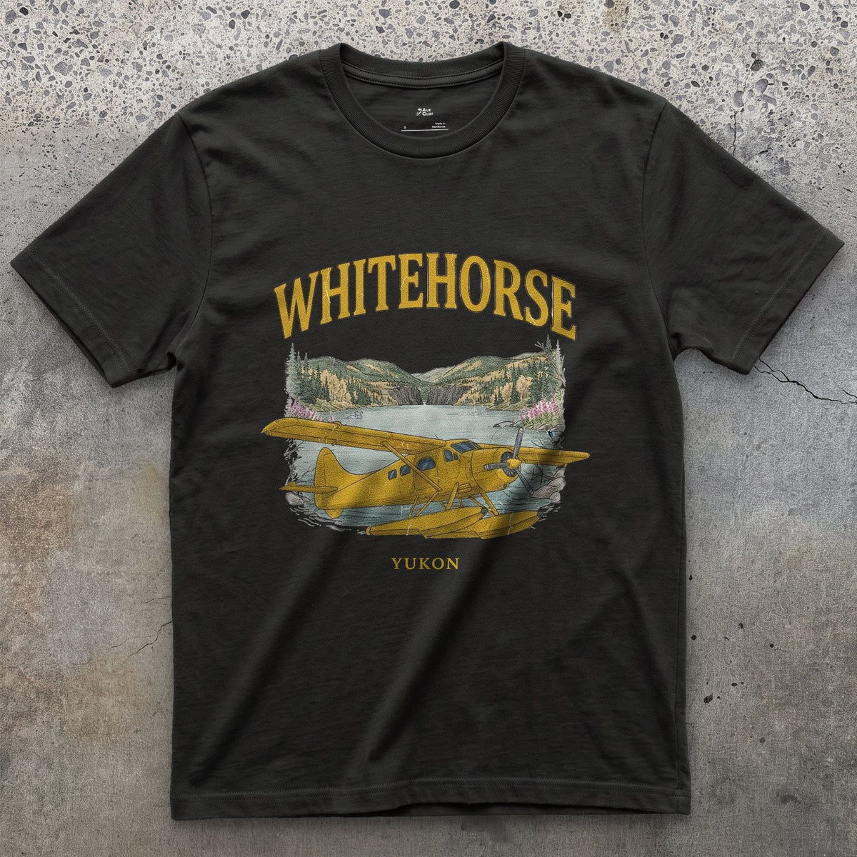 Whitehorse Bush Plane design on a Black Gildan Softstyle t-shirt