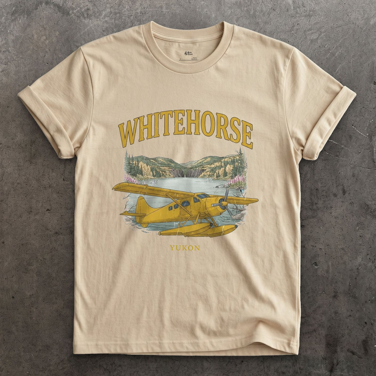 Whitehorse Bush Plane design on a Sand Gildan Softstyle t-shirt