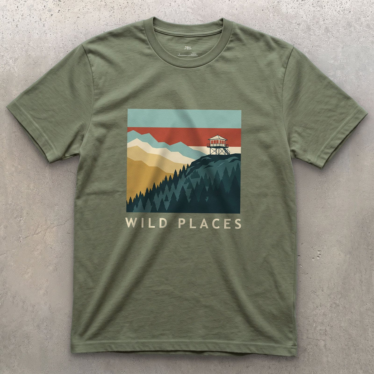 Wild Places, Fire Lookout on the Ridge design on a Military Green Gildan Softstyle t-shirt
