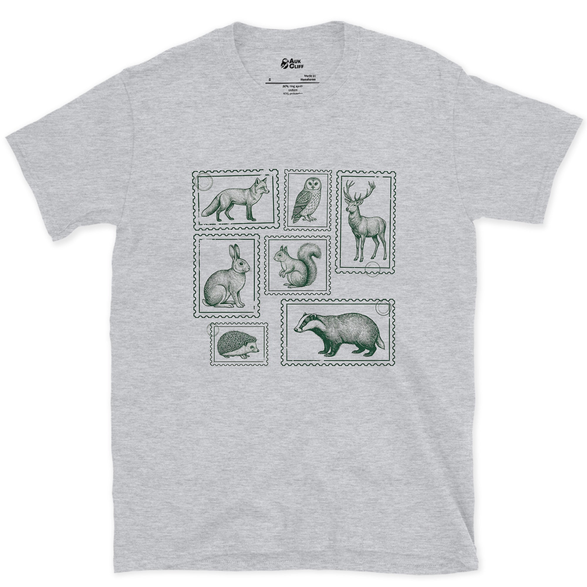 The Whole Woodland Framed Like Stamps design on a Sport Grey Gildan Softstyle t-shirt