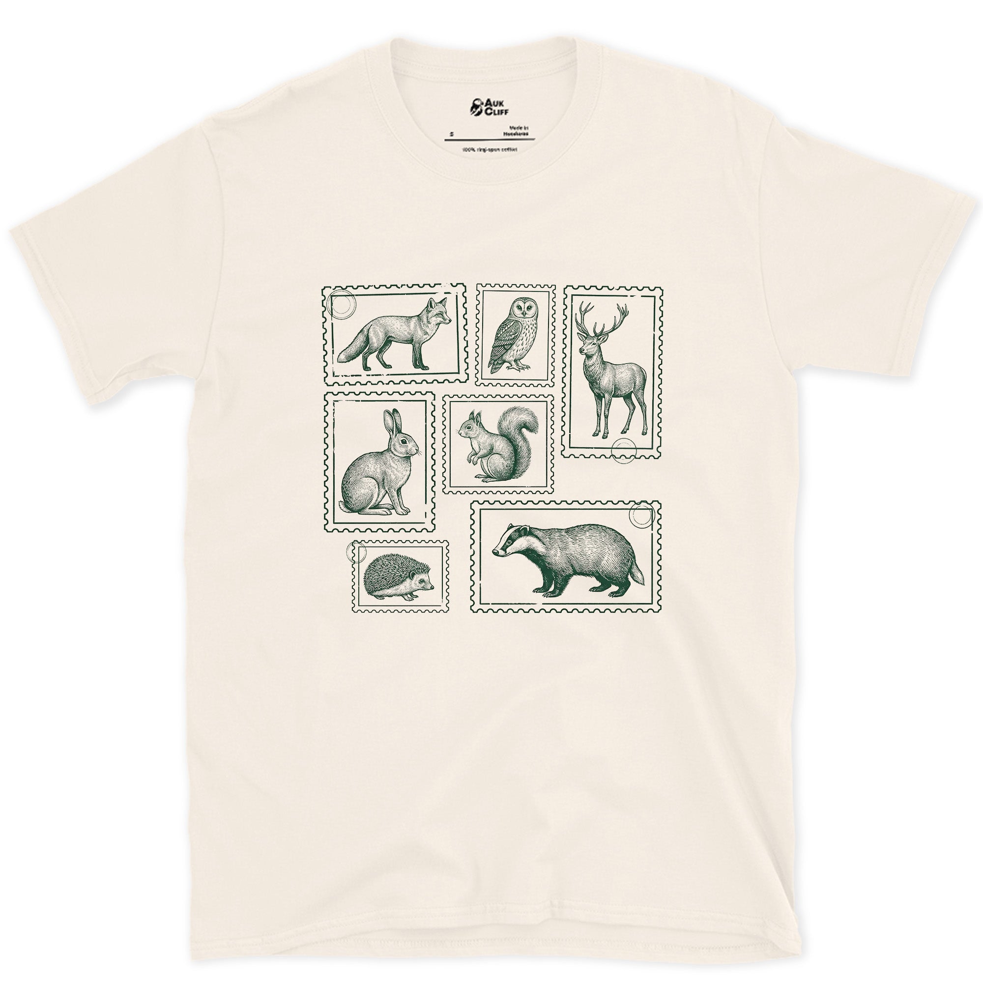 The Whole Woodland Framed Like Stamps design on a Natural Gildan Softstyle t-shirt