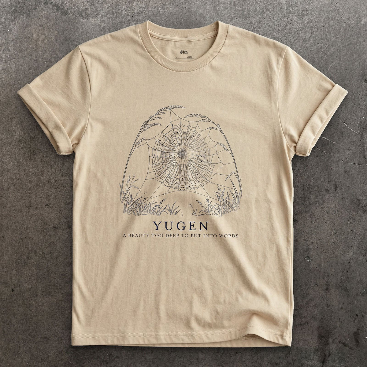 Yugen, a Beauty Too Deep to Put Into Words design on a Sand Gildan Softstyle t-shirt