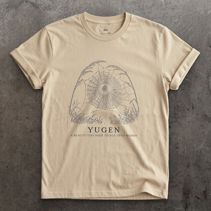 Yugen, a Beauty Too Deep to Put Into Words design on a Sand Gildan Softstyle t-shirt
