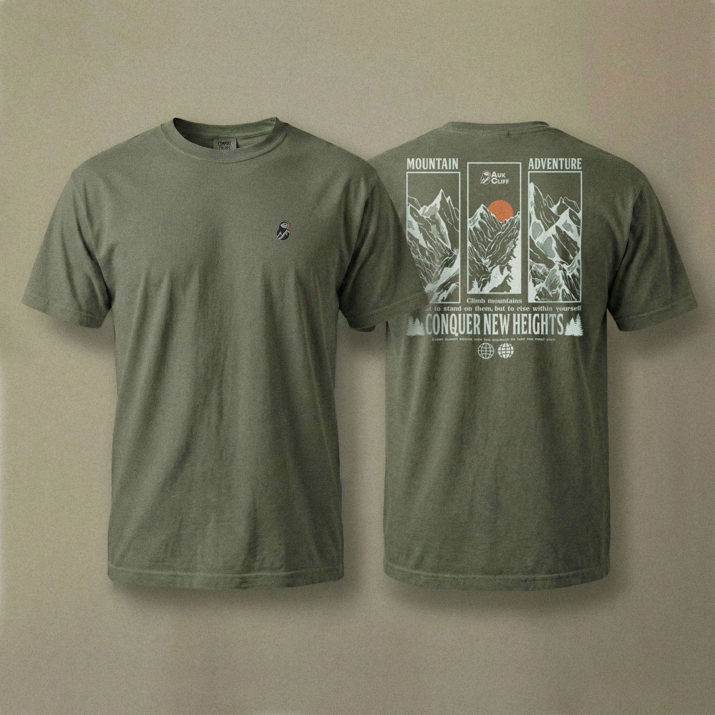 AukCliff Rear Print Comfort Colors T-shirt Moss / S Conquer New Heights Mountain Comfort Colors T-Shirt