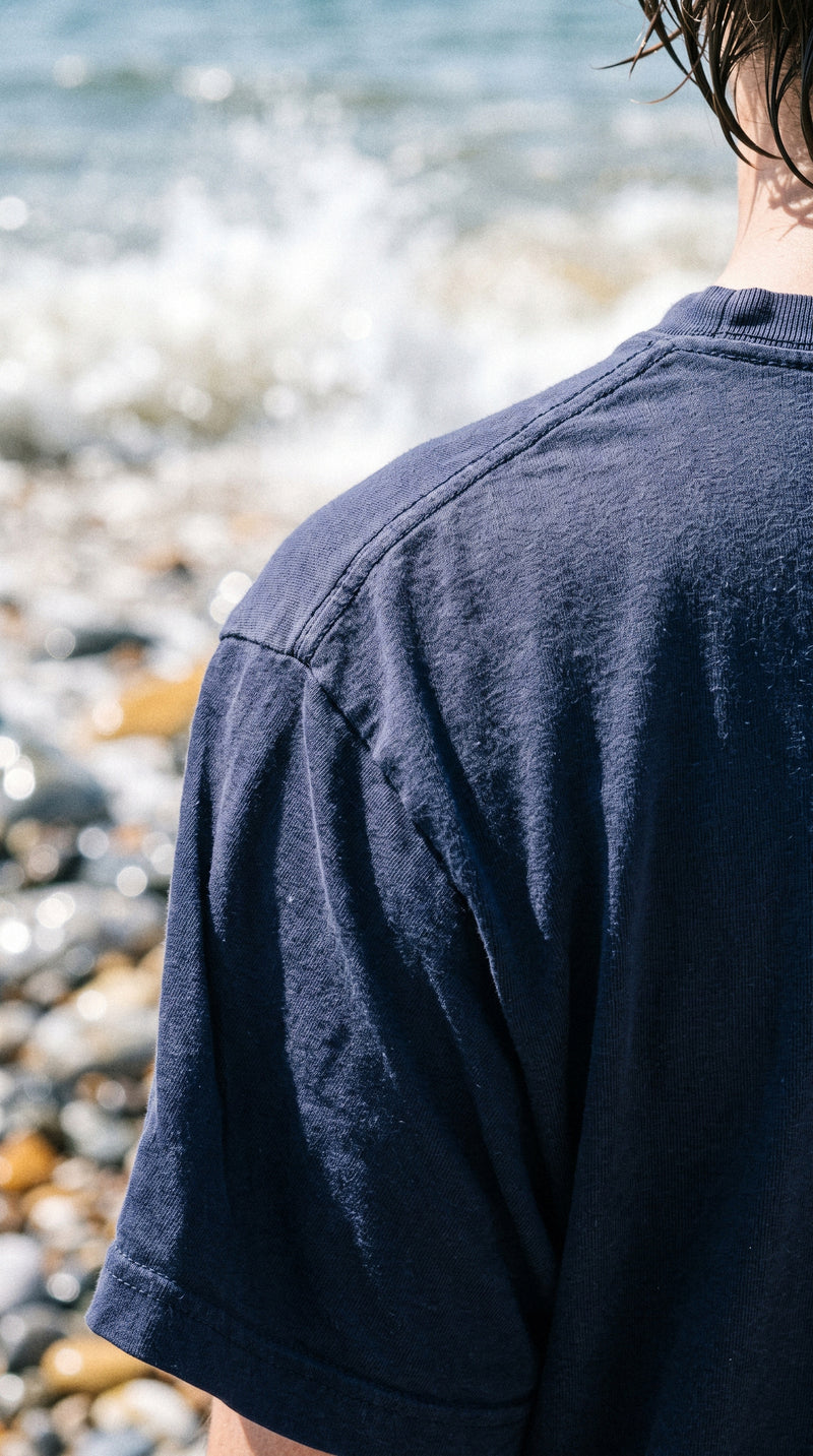 AukCliff t-shirts worn at a shingle beach, photo 2